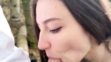 Slut sucks cock in the woods and gets full of cum