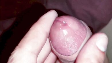 Close-up of sperm pouring out of a penis