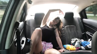 My friend undresses in my car, showing her breasts, eager for a penis.