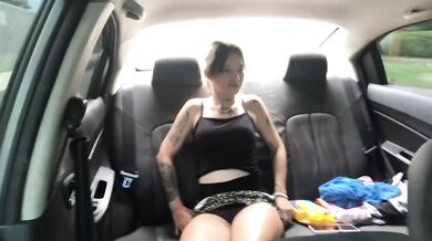 My friend undresses in my car, showing her breasts, eager for a penis.