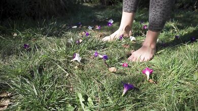Crushing Flowers Barefoot In The Grass