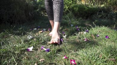 Crushing Flowers Barefoot In The Grass