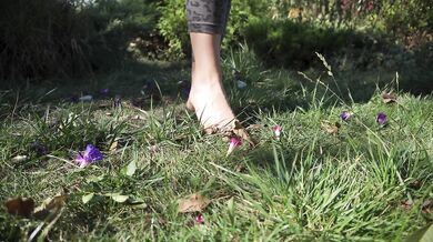 Crushing Flowers Barefoot In The Grass