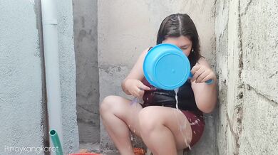 Filipina taking a bath outside the house got fuck