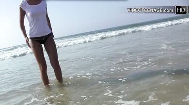 18 years old brunette naked at beach