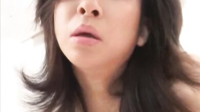 Titty fucking asian MILF babe jerks dick