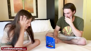 Riding his hard cock after losing a Connect 4 strip game with her friend