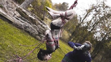 Outdoor Bondage Shibari Suspension - Tattoo skinny Girl in ropes on a tree