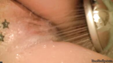 Emo Emily Rubbing shower on her pussy