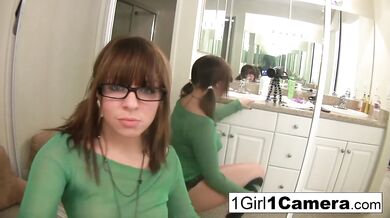 Sexy Alice Bell plays with her camera