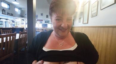 Trashy MILF shows all at a local bar. Could be caught at any time