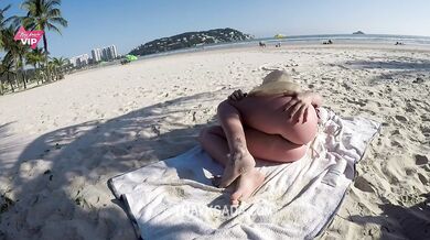 Hot wife masturbating on the beach