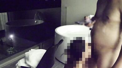 Asian couple having sex in an outdoor jacuzzi, someone is peeking.