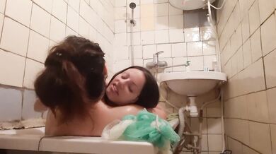 I called a friend to wash me back and dragged her to bathroom in her clothes. It was wet sex.
