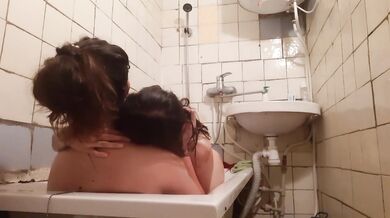 I called a friend to wash me back and dragged her to bathroom in her clothes. It was wet sex.