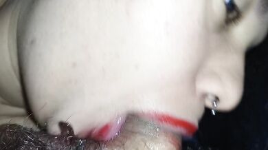 The best blowjob in the world, with the best close-up, her red lipstick-covered lips smearing the whole cock.