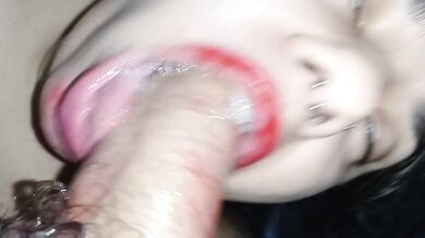 The best blowjob in the world, with the best close-up, her red lipstick-covered lips smearing the whole cock.
