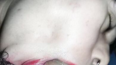 The best blowjob in the world, with the best close-up, her red lipstick-covered lips smearing the whole cock.