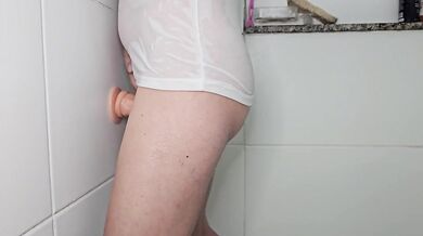 Suction dildo fuck against the wall
