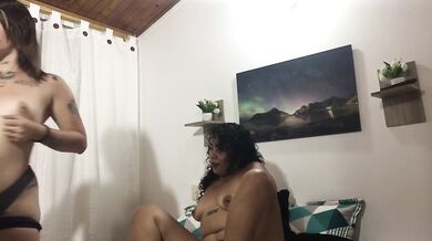 sexy girls caress their bodies, take off their clothes and finger each other's pussies in the bedroo