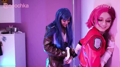 Handcuffed esbians rough each other up in a prison cell and kiss with tongue