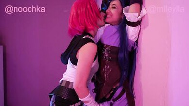 Handcuffed esbians rough each other up in a prison cell and kiss with tongue