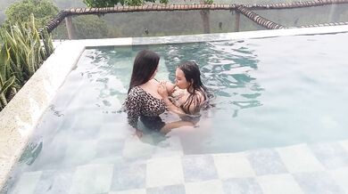 playing in the pool and sucking her tits