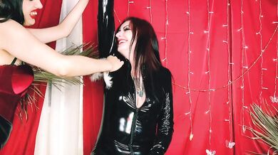 Tickling with a feather. Real emotions, loud laughter. Tickle fetish. PVC catsuit