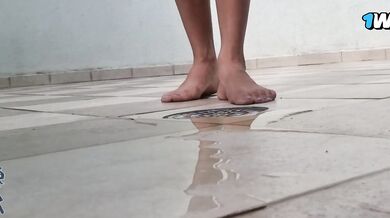 Two sluts pee during a call to tease the boy