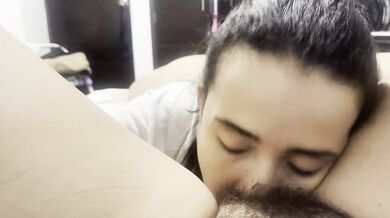 Lesbian sucking her boyfriend's hairy pussy before going to bed