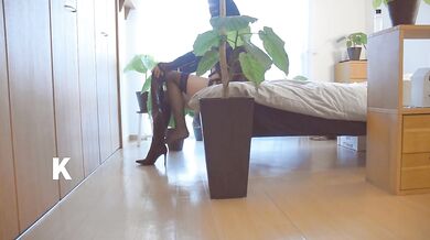 A perverted mature woman masturbates while wearing a double-headed dildo strap-on, which was a gift