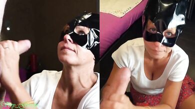 MILF with the catwoman mask sucks off her husband & gets a huge load on his face then licks the cum