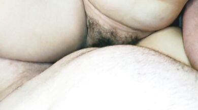 Cumshot on hairy pussy with big clit