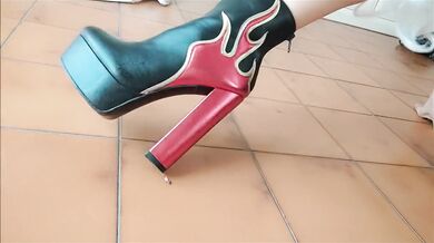 the giantess in giant heels will have no mercy on him