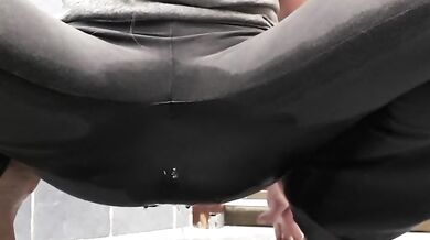 Pee desperation in yoga pants ending up big puddle on the floor