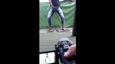 How we make video Desperate Pee in Jeans on balcony in centrum City
