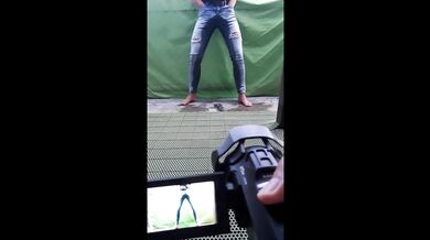 How we make video Desperate Pee in Jeans on balcony in centrum City