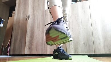 Sweaty feet after workout. Stinky socks and sneakers.Sniffing - OlgaNovem