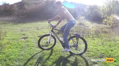 Milf Topless bike ride along river bank (music)