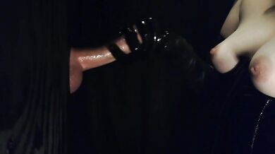 Black latex gloves at the gloryhole