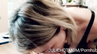 stepmother surprises her stepson and sucks his cock in front of a porn movie