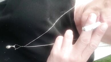 Smoking cigarette in black pantyhose outside make hole for my clit and turn off cigaret by my Pee