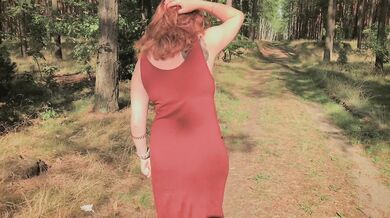 Playful Redhead Pissing in Forest and Showing her Big Boobs