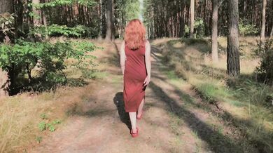 Playful Redhead Pissing in Forest and Showing her Big Boobs