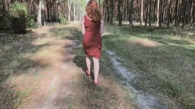 Playful Redhead Pissing in Forest and Showing her Big Boobs