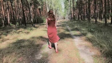 Playful Redhead Pissing in Forest and Showing her Big Boobs