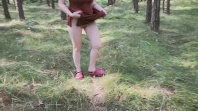 Playful Redhead Pissing in Forest and Showing her Big Boobs