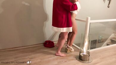 innocent Christmas angel gets fucked by Santa Clause near fire cum on pussy