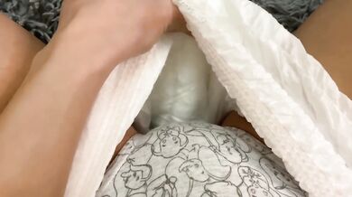 Peeing in panties inside a diaper