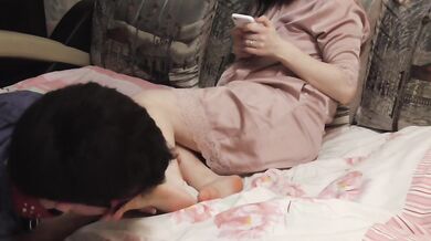 Licked his wife's feet while she was chatting with her lover
